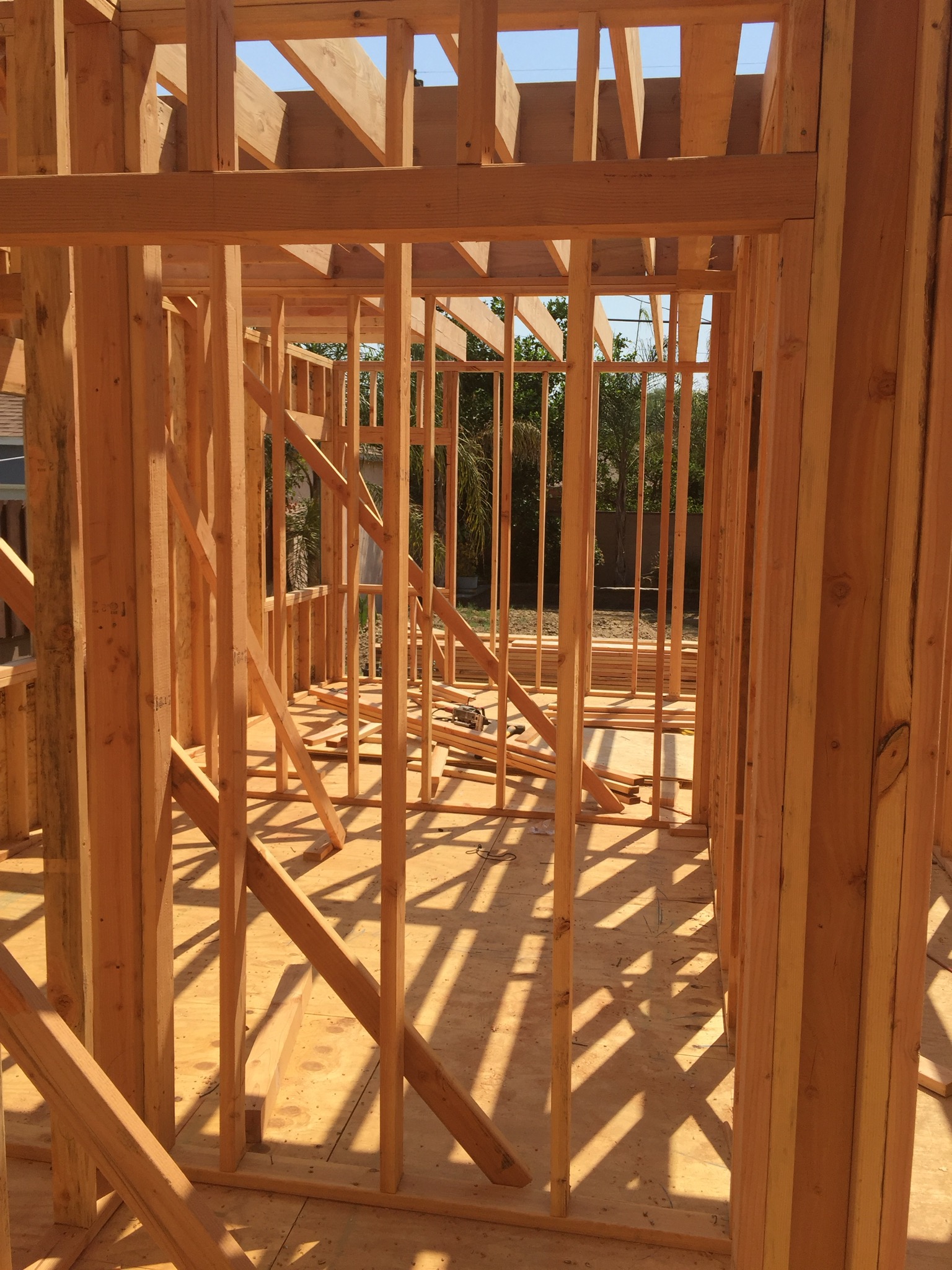 A wooden frame of a house under construction