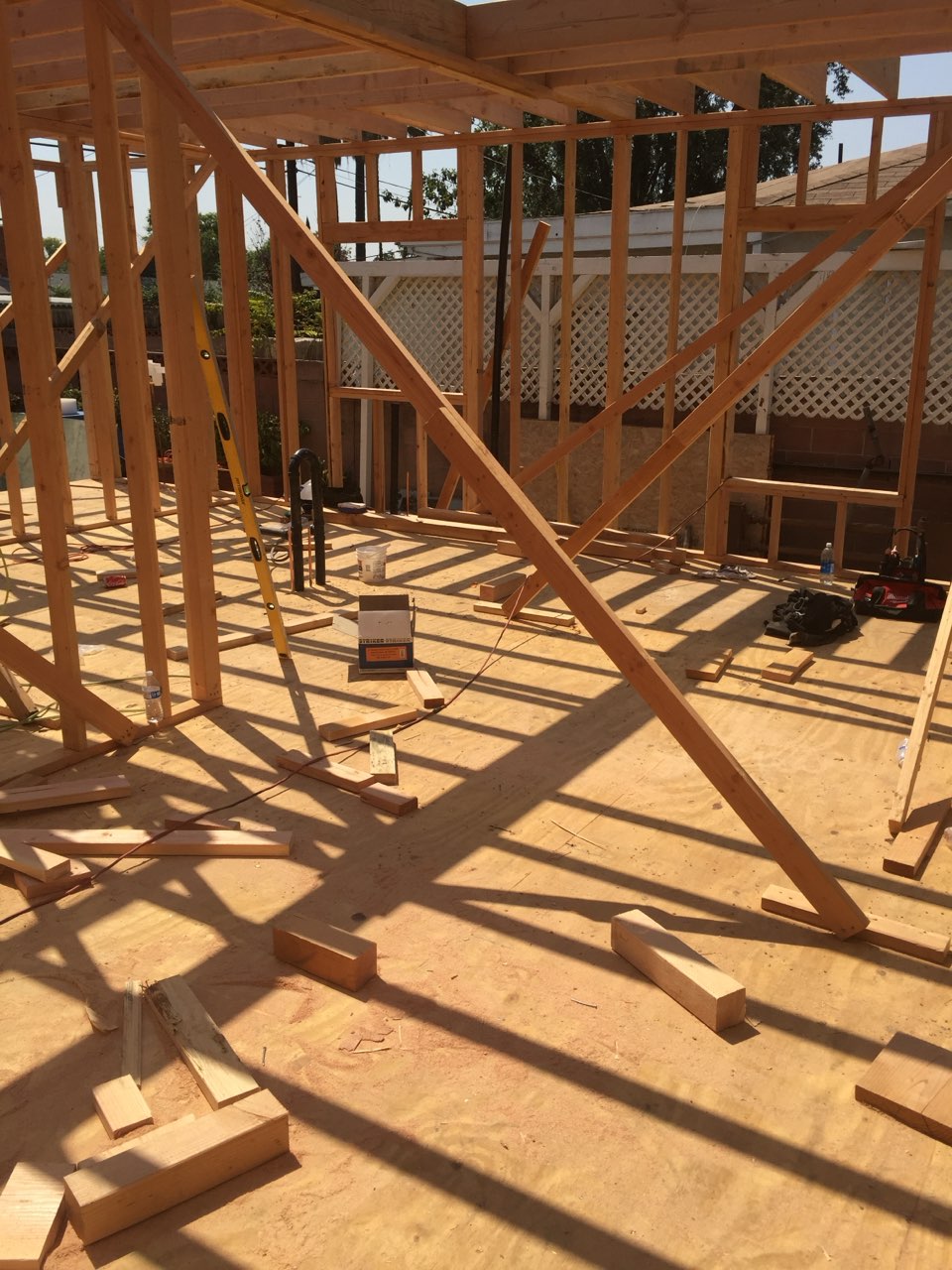 A house being built with wooden framing